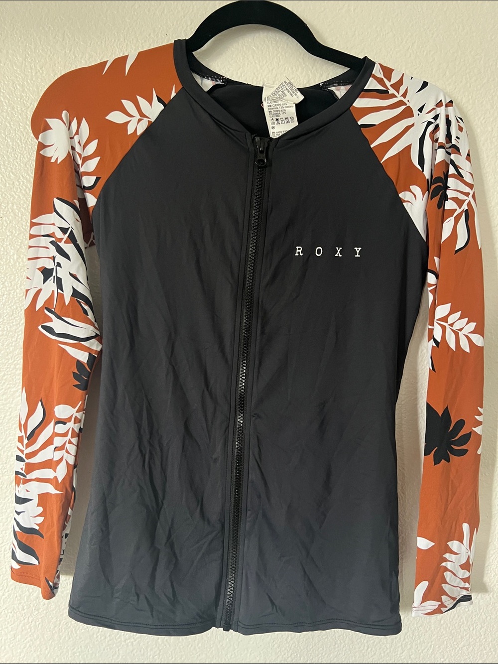 Roxy Black Zippered Rash Guard with Rust Floral Sleeves